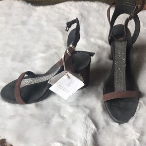 Brunello Cucinelli brown leather t-strap sandals.